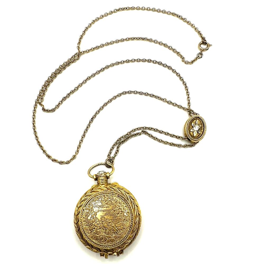 Max Factor 1950s Precious Time gold tone watch fragrance locket slider necklace
